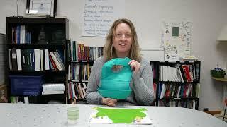 Demonstrating the Tenura Anti-Slip Mat and Oxo Baby Bib