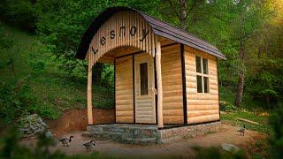 Do-it-yourself wooden house in the forest. Alone with nature