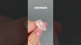 Let‘s us DIY cute flowers nail design.  #nails #nailart #nailsathome #nailsdesign #nailtutorial