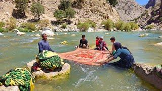 Preparing the Kuhgol family for a trip to the village and washing carpets and blankets in the River