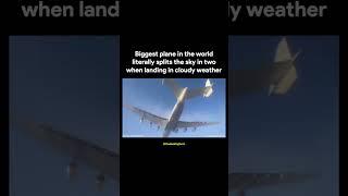 Cool cloud effect from airplane splitting the sky
