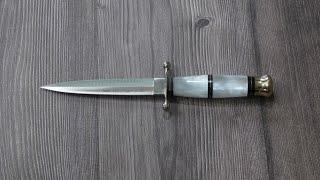 The Linder Dagger with white perlex handle