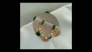 Beautiful gold with green gems earrings design/22 November 2022