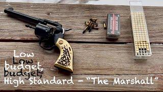 Low budget, High Standard- “The Marshall” 22 caliber revolver. Double or single action 9 shot 22LR