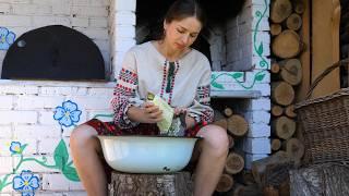 Hard work in a village. Cooking lunch in village oven. Building DIY fence for duck farm