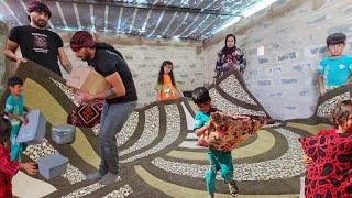 Sajjad and her family move their belongings to their new home.