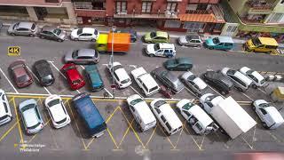 06.16.2020 Puerto de la Cruz, Spain, a small parking lot in the middle of the city. Time lapse.