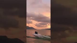 Sunset jetski at Lake Toba - North Sumatra