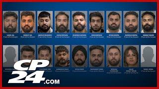 18 people arrested after extortion probe of 'violent' criminal organization