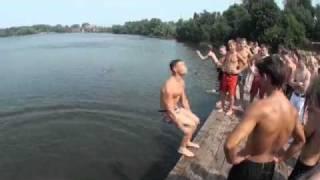 Guys do insane tricks and flips jumping in the water