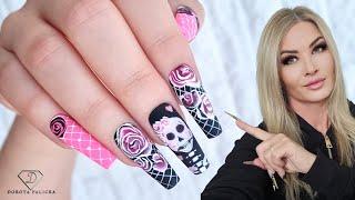 Halloween skull nail art . Pink snd black Halloween nails