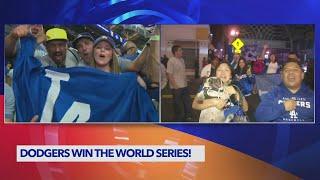 Dodgers fans celebrate their win live from Yankee Stadium