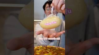 My 370 month old husband first time trying fufu 