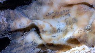 THE GROTTO CAVE WITH OLD WRITING ON THE WALLS - QUANTOCK HILLS