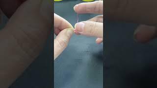 Slow motion of the inner cable wrapping around the finger-tying hook