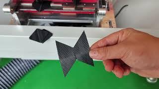 Automatic webbing hole punching and shape cutting machine
