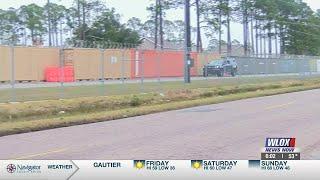 Gulfport Seabee Base using shipping containers to shield base housing from gunfire