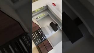 @howdens Hockley Walnut range with SlabTech worktop install #kitchen #howdens #showroom