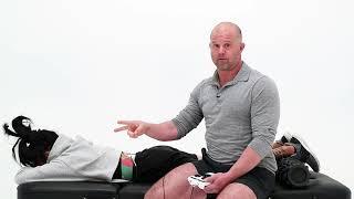 How to break muscle spasms using high frequency H-Wave treatment | Kelly Starrett