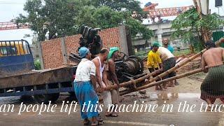 heavy weight machine lifting on the truck gari (@sanjibd)