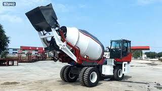 Construction machine self-loading concrete mixer