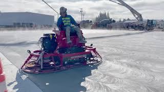 Concrete Finishing, Laser Screed & Rider Trowel putting it down in Western Washington.