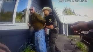 Pacific County Sheriff's Office Deputy assaulting man on his front porch.