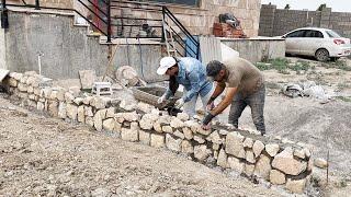 Training on building a stone retaining wall in 5 parts