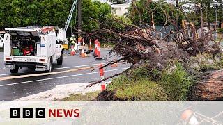 Body found in floodwaters and troops injured in Australia storm | BBC News