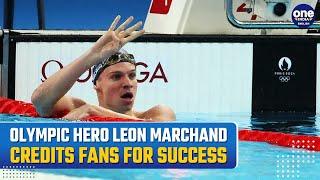 French Swimmer Leon Marchand Shines at Paris Olympics, Credits Fans for Success in Exclusive DW