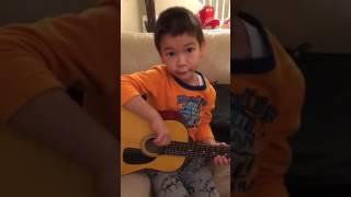 Liam starts to learn how to play guitar