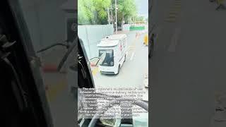 Robot vs. Machine: Hilarious Standoff Between Stubborn Delivery Bot and Determined Excavator!