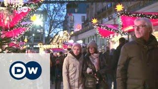 Festivity muted at Cologne Christmas market | DW News