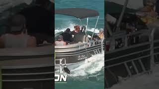 Pontoon in trouble with rough waves.