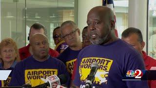 Airport workers rally to demand better wages