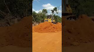 Incredible Strong Power Bulldozer Pushing Clearing Red Dirt  Mountain Road Construction