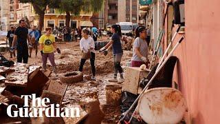 Spain floods: Thousands volunteer to help clean up as countless remain missing