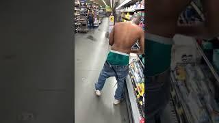 Man on Drugs Eats and Destroys Everything At Walmart