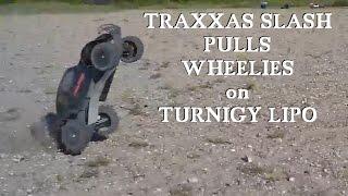 Traxxas Slash pulls INSANE WHEELIES on Turnigy NanoTech Lipo at Beach - Darconizer RC