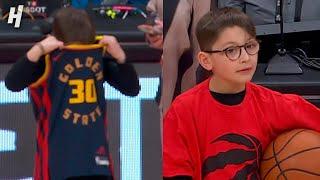 Raptors made a kid take off his Steph Curry jersey & put a Raptors T-shirt on him