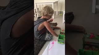 Aleks painting garbage truck - toddler activity