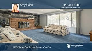 Amy Cash Real Estate-. This large mid century block home sits on a lushly landscaped 1/4 acre lot.