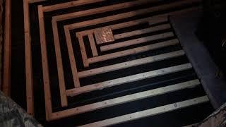 Mike applying the Ben Square method for prepping sauna hot room floor, sloped to center drain