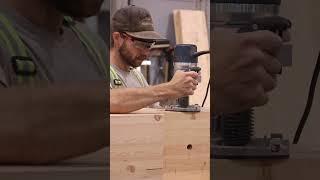 Using a Bosch router, Andrew cuts a mortise into the massive timber glulam. #timber #glulam #tools