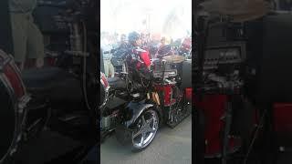 Drummer on wheels,antique sideshow Dania beach Florida,the man stoked the show.