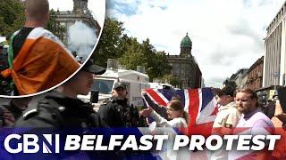 Belfast: Anti-immigration protesters fly Tricolour and Union Jack together - Never seen in my life!