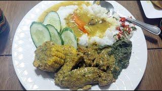 Here's a totally awesome plate of food. Curried corn, chicken, bhagi, dhal and rice SITUATION!