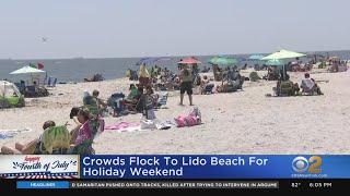 Crowds Flock To Lido Beach For Holiday Weekend