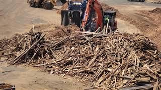 Portable chipper processing scrap wood