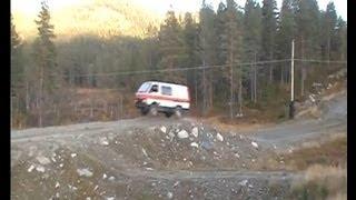 Toyota Hiace car jump straight on rock